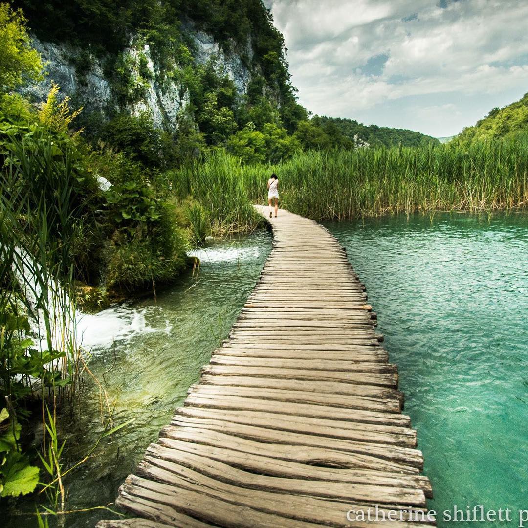 Catherine Shiflett Photography, Souls, Portraits and Street Photography, woman walking down a wooden path, Plitvice Lakes, Croatia,  Nikon D800